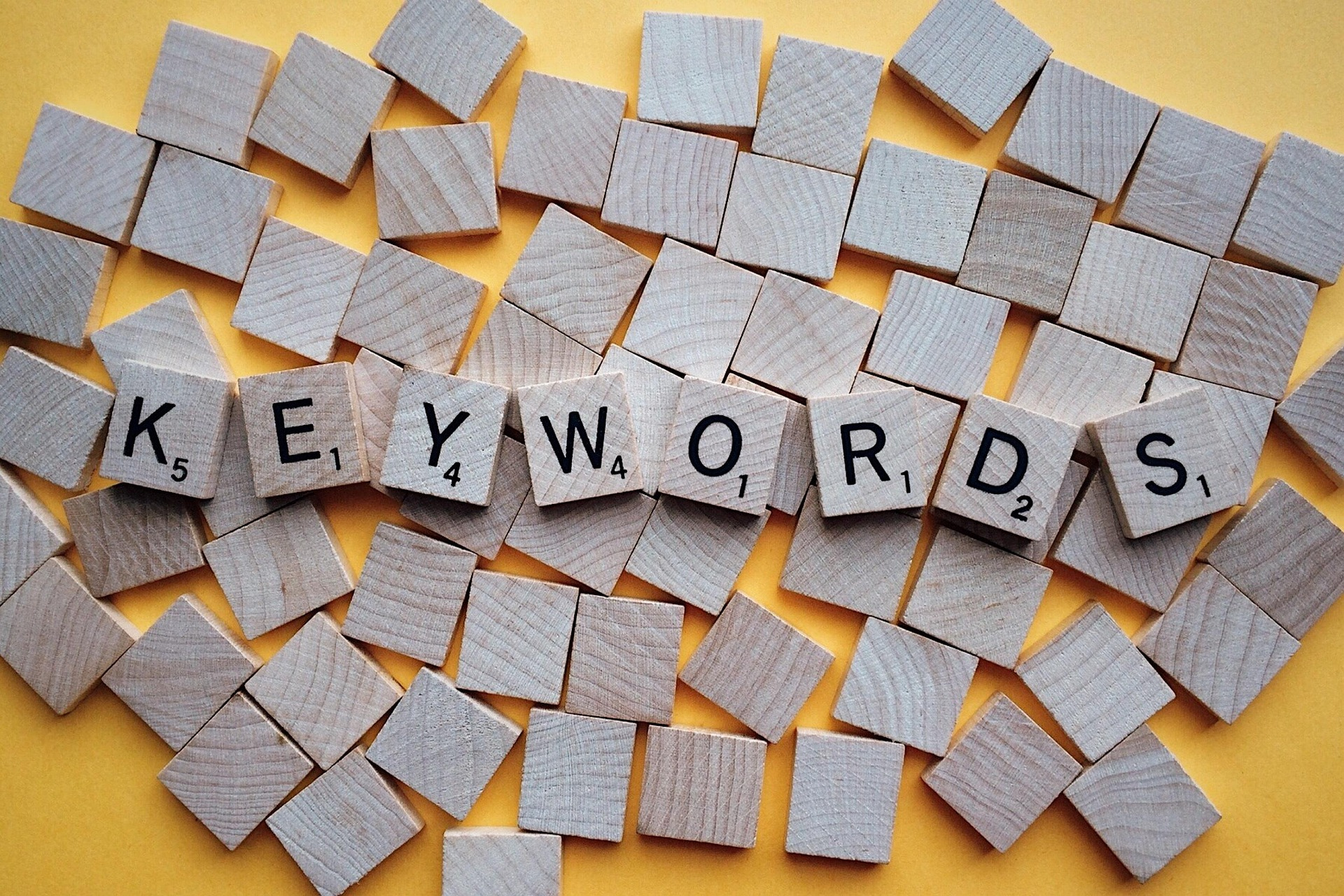 Coquitlam SEO expert analyzing keyword data on a laptop for local business marketing by Cypress Click